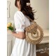 The 2025 new straw-woven bag features a niche design for women, is a fashionable and versatile small round bag that can be carried across the body for beach vacations