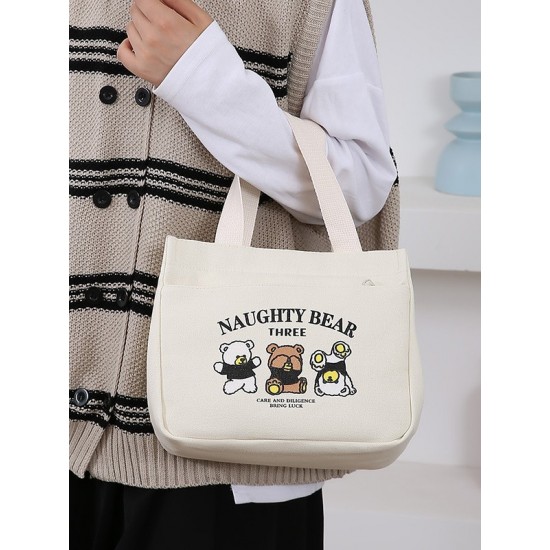 A large-capacity, cute and versatile student canvas bag, a handbag for female mothers to carry when going out, and a commuting bento bag for office workers