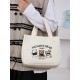 A large-capacity, cute and versatile student canvas bag, a handbag for female mothers to carry when going out, and a commuting bento bag for office workers