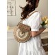 The 2025 new straw-woven bag features a niche design for women, is a fashionable and versatile small round bag that can be carried across the body for beach vacations