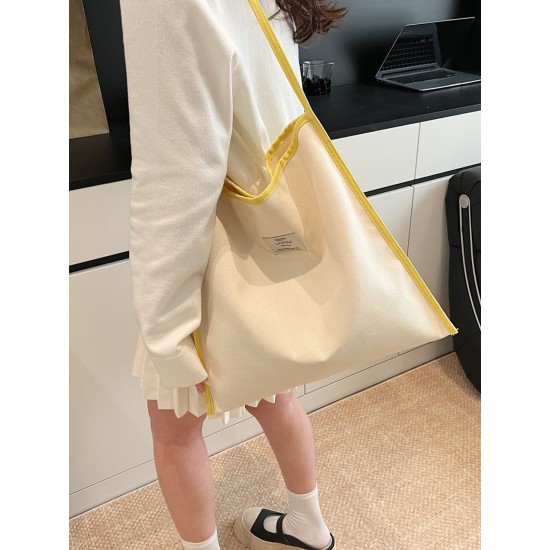 The 2025 summer new Dopamine-colored large-capacity single-shoulder tote bag is a simple and versatile student commuting bag for class The 2025 summer new Dopamine-colored large-capacity single-shoulder tote bag is a simple and versatile student commuting bag for class