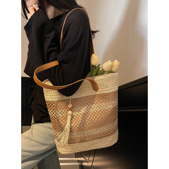 The 2025 summer new tassel fashion and versatile hollowed-out woven bag, straw woven bag, beach bag, single-shoulder bag and women's bag The 2025 summer new tassel fashion and versatile hollowed-out woven bag, straw woven bag, beach bag, single-shoulder bag and women's bag
