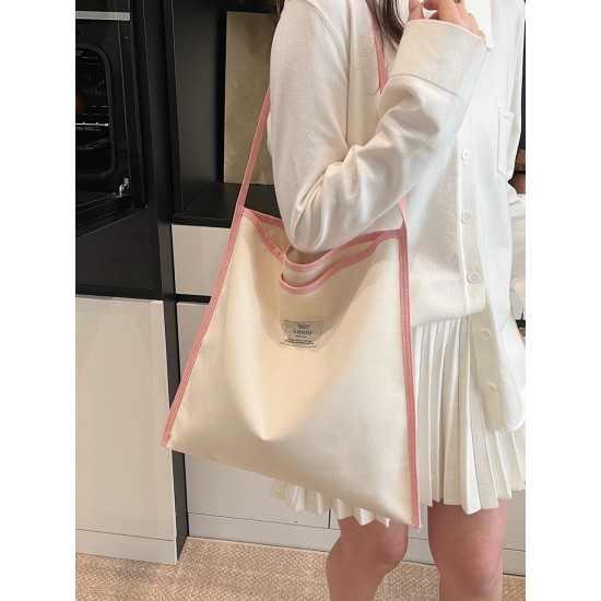 The 2025 summer new Dopamine-colored large-capacity single-shoulder tote bag is a simple and versatile student commuting bag for class The 2025 summer new Dopamine-colored large-capacity single-shoulder tote bag is a simple and versatile student commuting bag for class